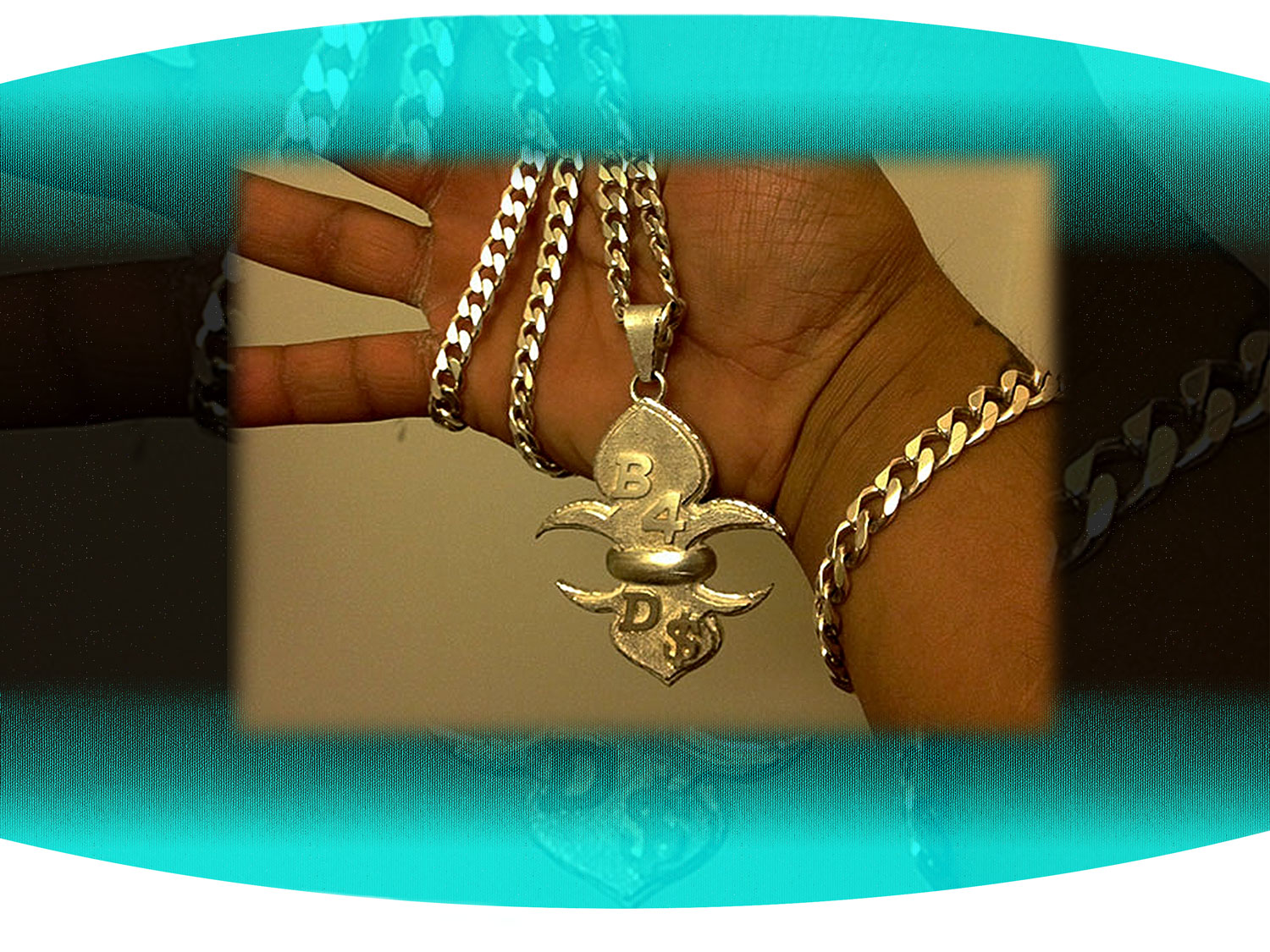 Close up of sterling silver chain with B4DS in the shape of a fleur de lis