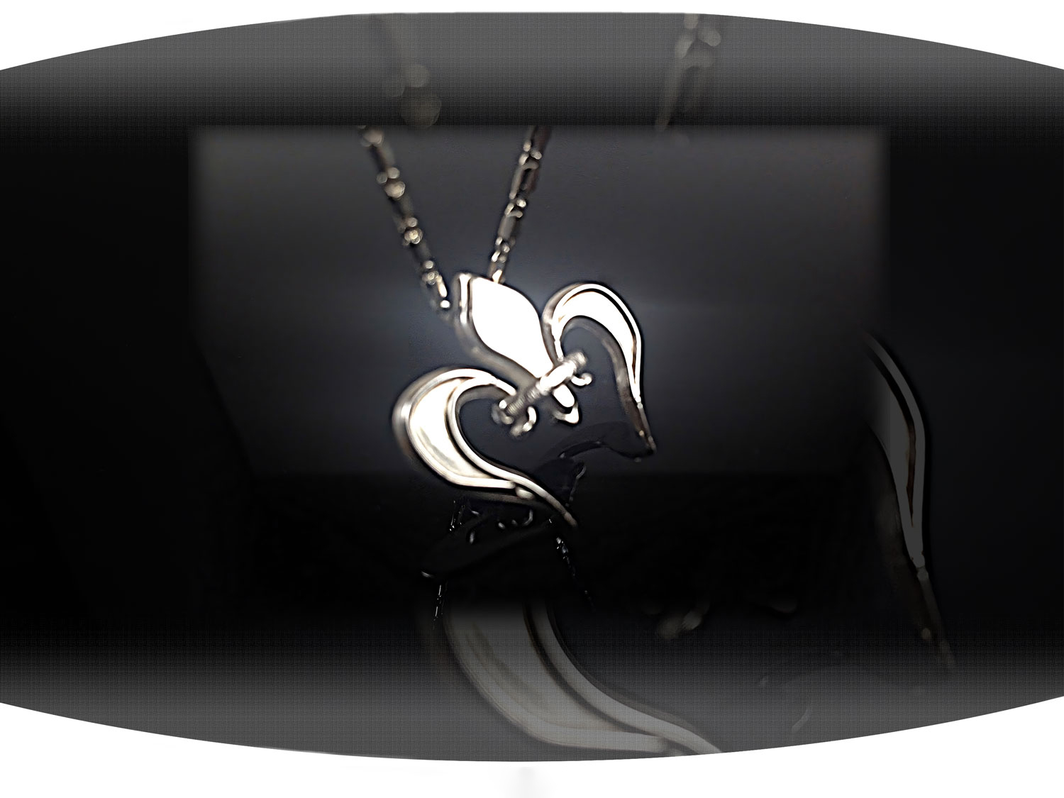 Sterling silver custom heart shaped fleur de lis necklace