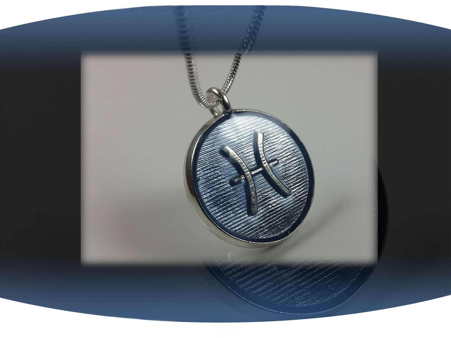 Sterling silver zodiac sign  pisces pendant with light blue resin and star constellation on the back