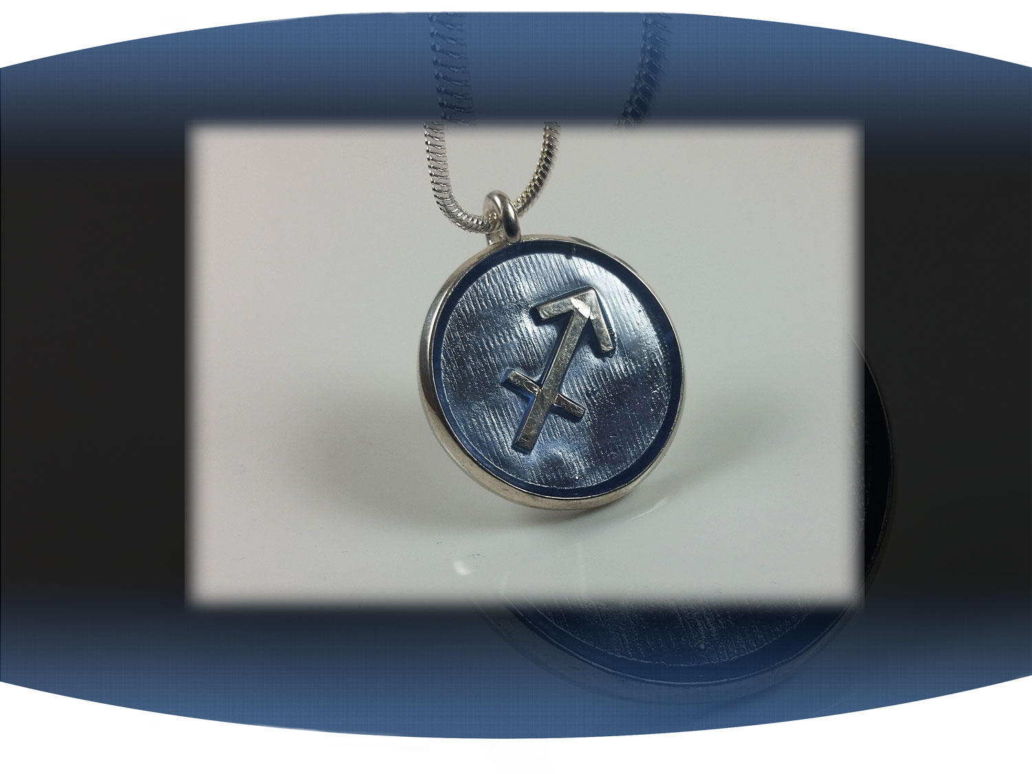 Sterling silver zodiac sign  sagittarius pendant with light blue resin and star constellation on the back