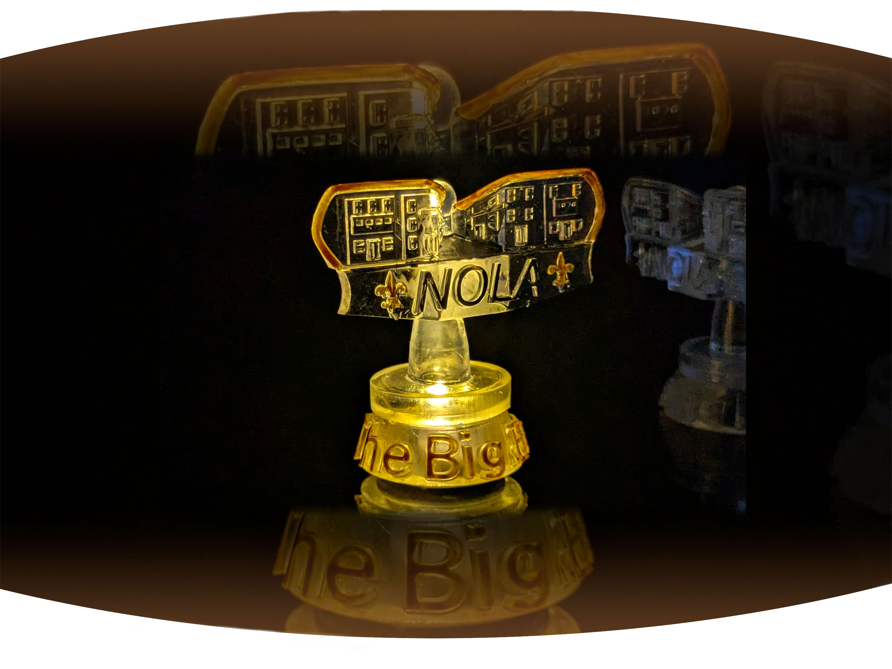 White screen printed  t-shirt with the black text Bywater with red stamp across it that says gentrified