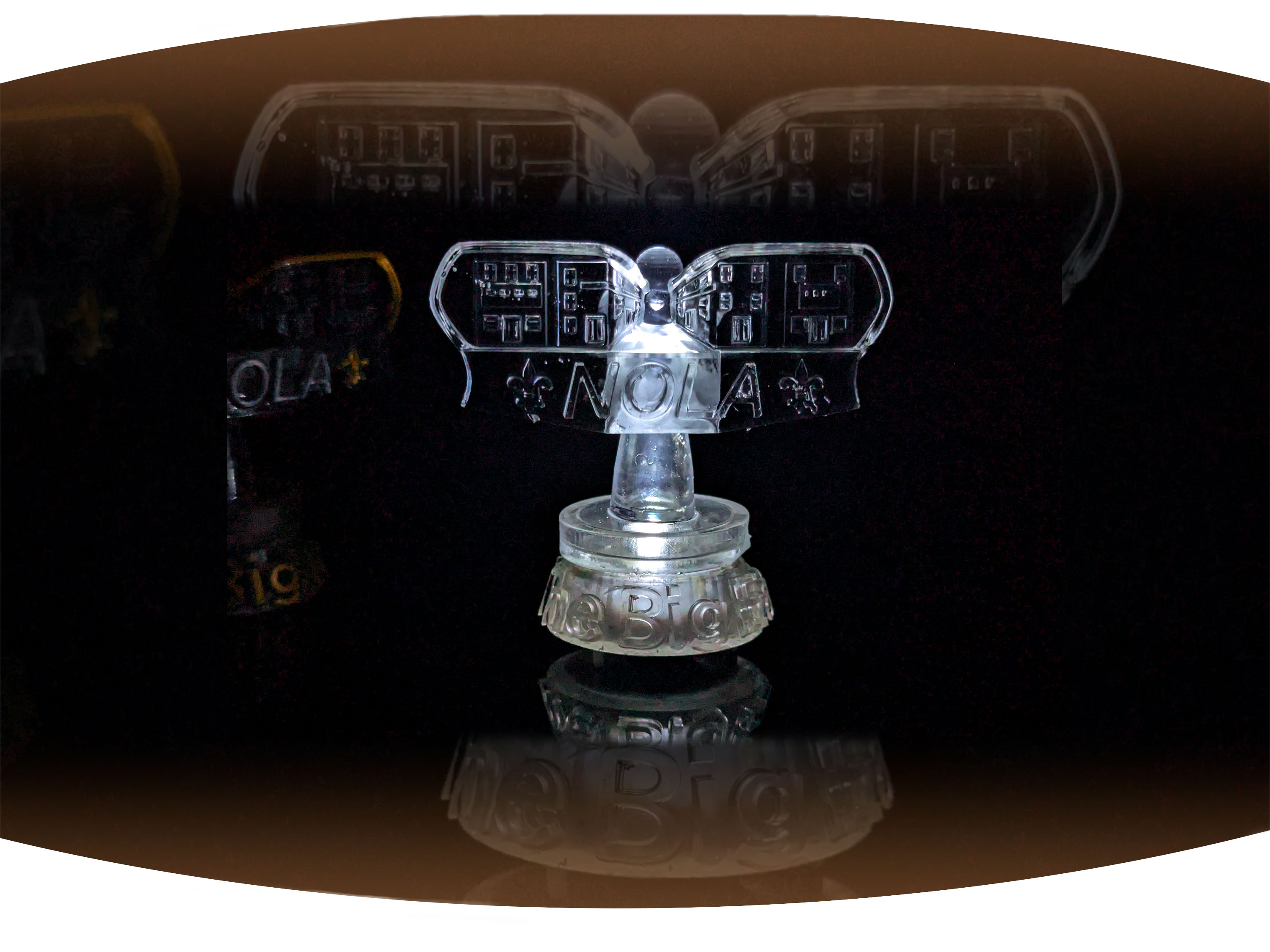 White screen printed  t-shirt with the black text Bywater with red stamp across it that says gentrified