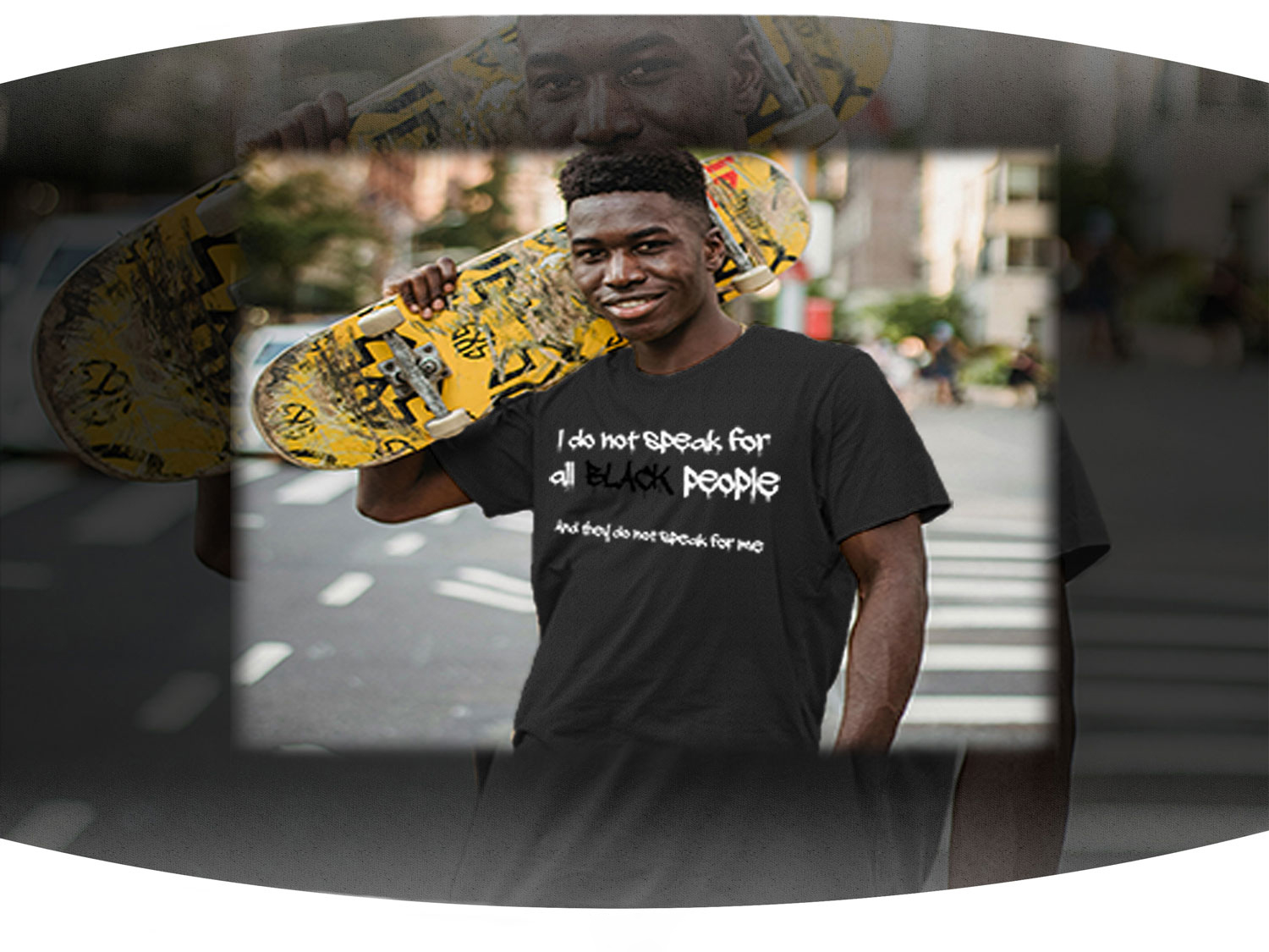 Black man holding yellow skate board wearing dark grey t-shirt with the phrase I do not speak for all black people on the front of it