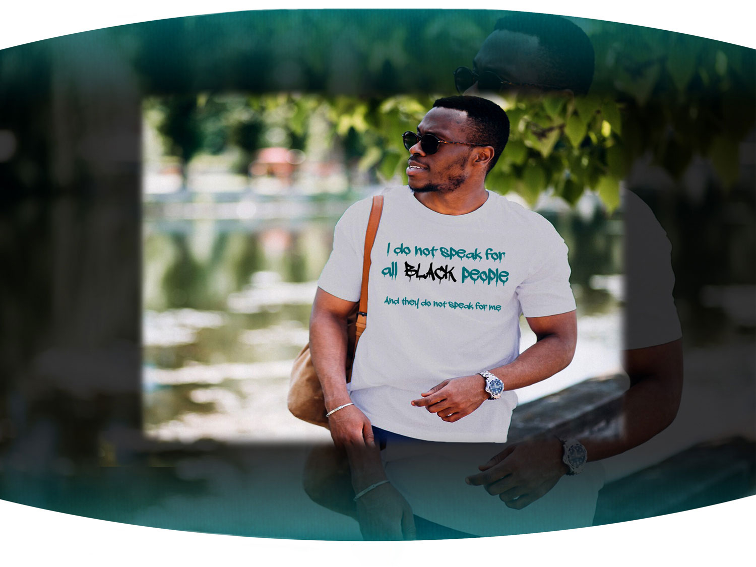 Black man outside wearing shades wearing light grey t-shirt with the phrase I do not speak for all black people on the front of it